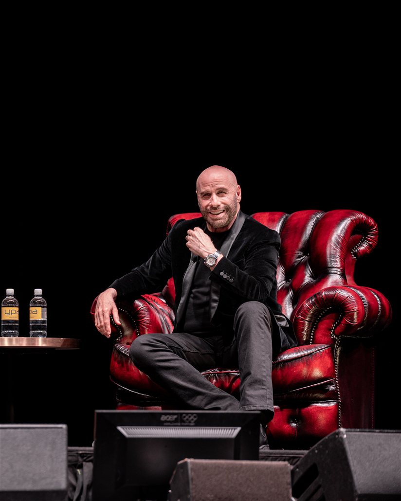 John Travolta on stage at an Anthology International evening